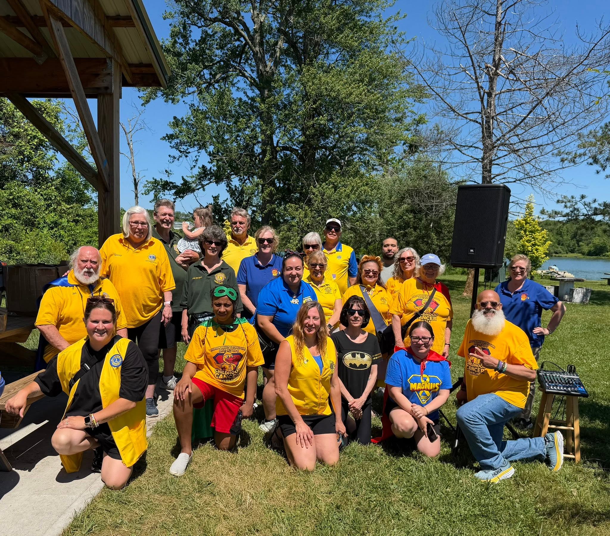 Lions Club members gathered at the Childhood Cancer Walk