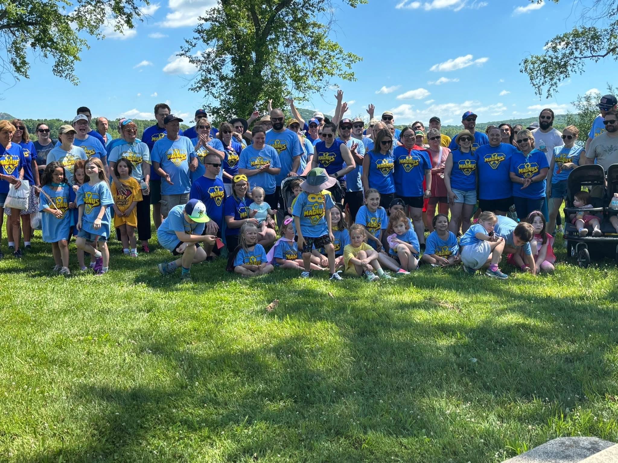 Team Magnus walkers in blue superhero shirts